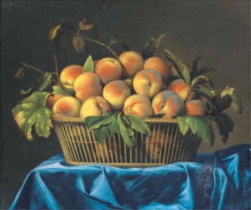 Peaches in a wicker basket on a draped table