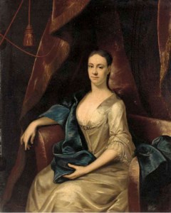 Portrait of Rebecca Branthwayt (d.1740), neé Newton, seated three-quarter-length, in a white satin dress and blue wrap in a draped interior