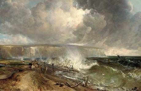 Figures walking on a shore in a stiff breeze