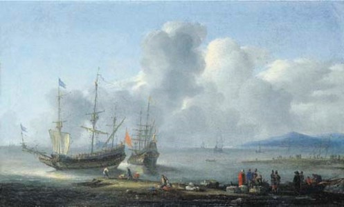 An coastal landscape with two merchantmen at anchor, merchants on a quay in the foreground
