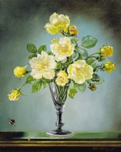 Yellow roses in a glass vase