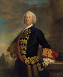 Portrait of a gentleman, traditionally identified as Lord John Murray, 1st Duke of Atholl (1711-1787), three-quarter-length, in a deep blue coat with red sash and cuffs decorated with gold brocade, his left hand resting on a column with a landscape beyond