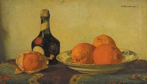 Oranges on a plate, with a Benedictine bottle