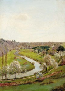 Cattle grazing at the bend of the river, a wood beyond