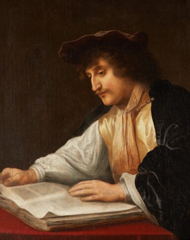 Portrait of a gentleman at a table