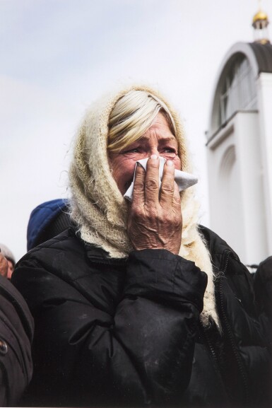 A resident of Bucha Watches as Authorities Excavate a Mass Grave, Bucha, Kyiv Region, 8 April 2022
