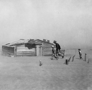 Farmer and sons walking in the face of a dust storm, Cimarron County, Oklahoma