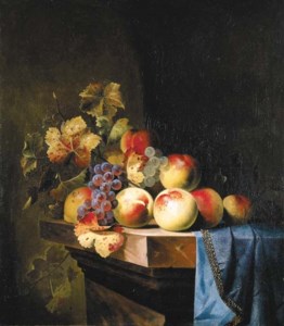 Peaches and grapes on a marble ledge