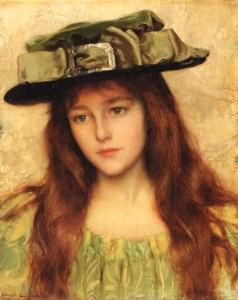 Young beauty in a green hat