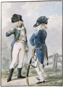 Two officers conversing by a fence