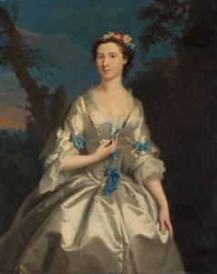 Portrait of the Duchess of Argyll, three-quarter-length, in an oyster satin dress trimmed with blue ribbons, in a wooded landscape