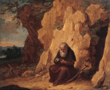 A hermit by a grotto