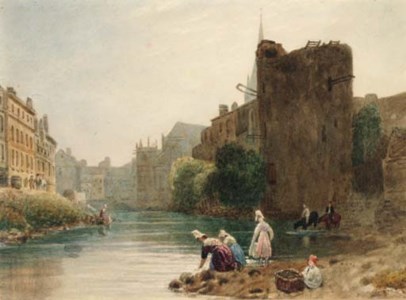 Women washing clothes in a French town river