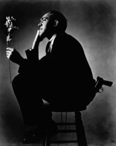 S.J. Perlman with gun and rose (1935)