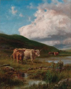 Cattle watering in a highland landscape