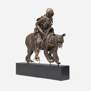 Figure riding bear