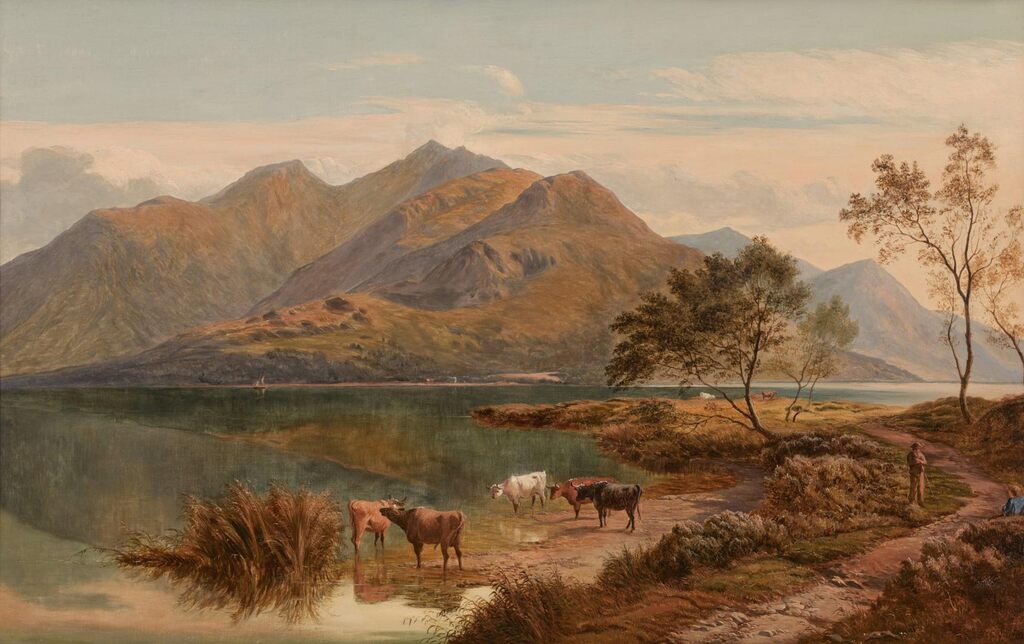 Cow herd by a lake