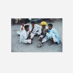 Villagers visiting Jodhpur enjoy iced sweets, Rajasthan