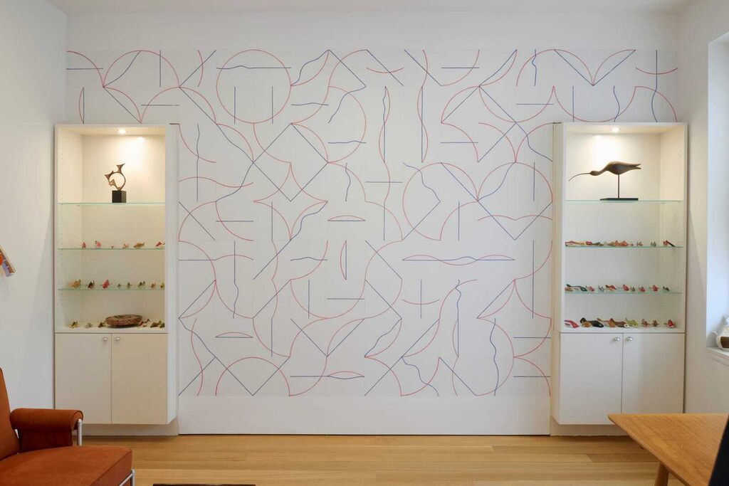Sol LeWitt, Wall Drawing #980, A 12-inch (30 cm) grid covering the wall. Within each 12-inch (30 cm) square, one red arc from one of the four corners or four sides and one blue line (straight or not straight)