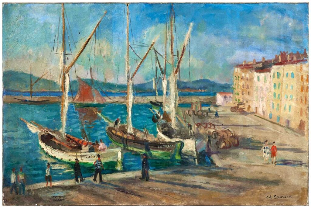 Tartanes docked in Saint-Tropez and two women strolling