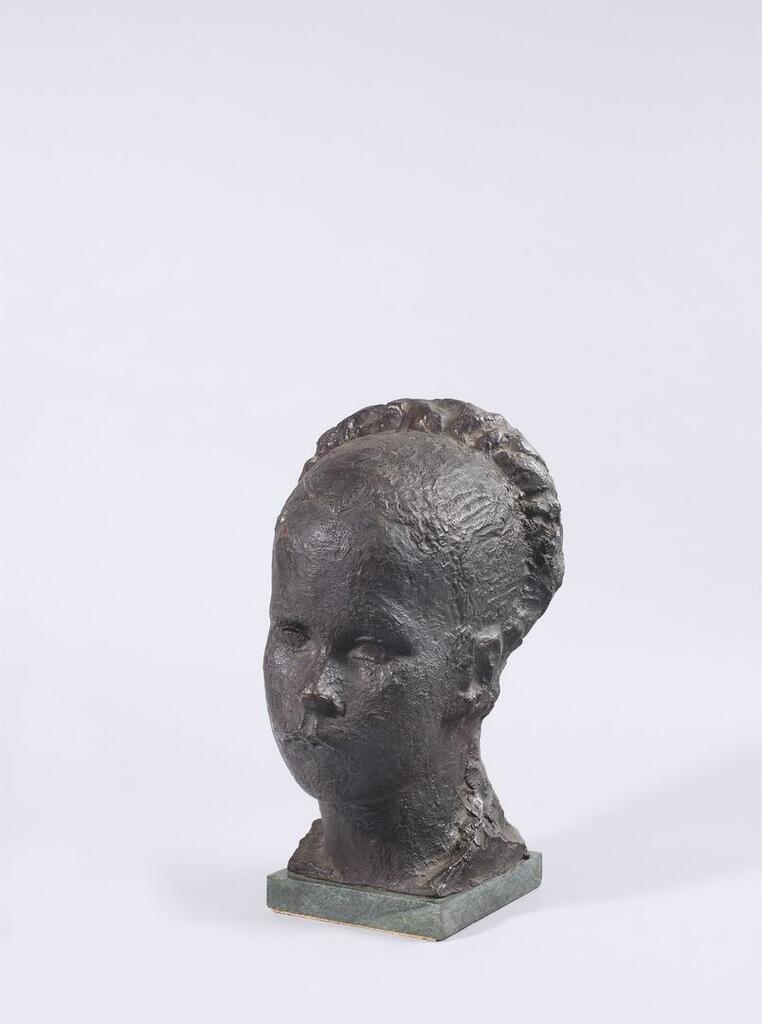 Female head with braided hair
