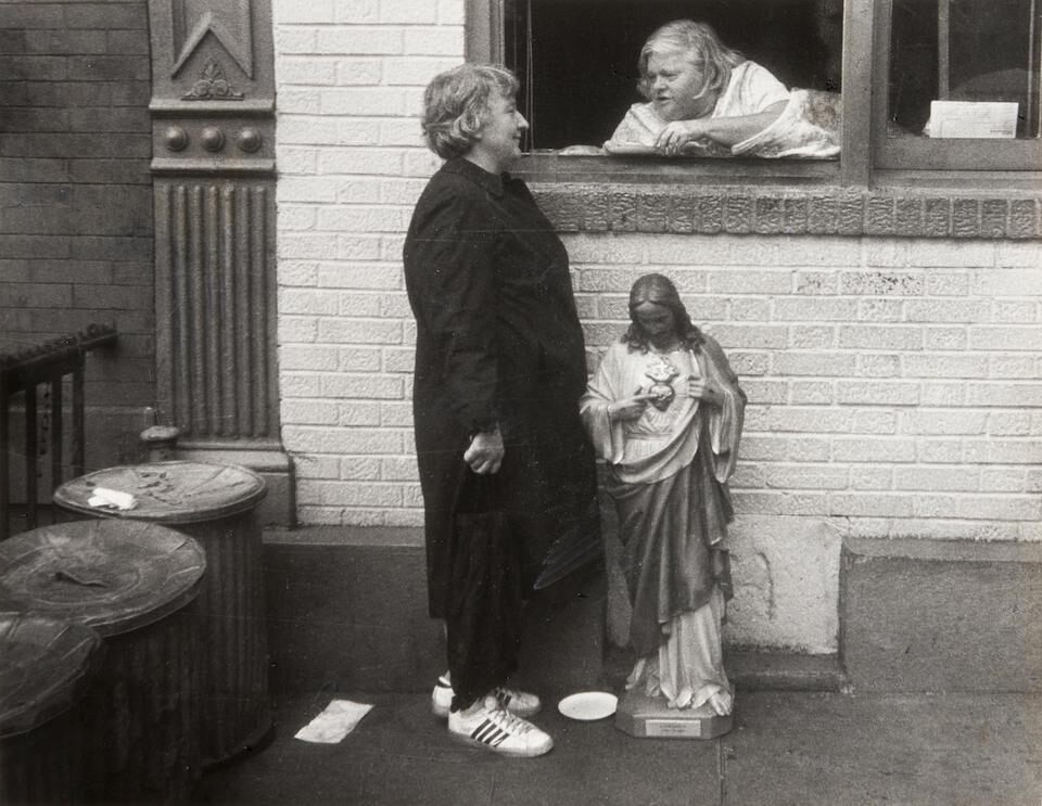 Untitled [two women at window]