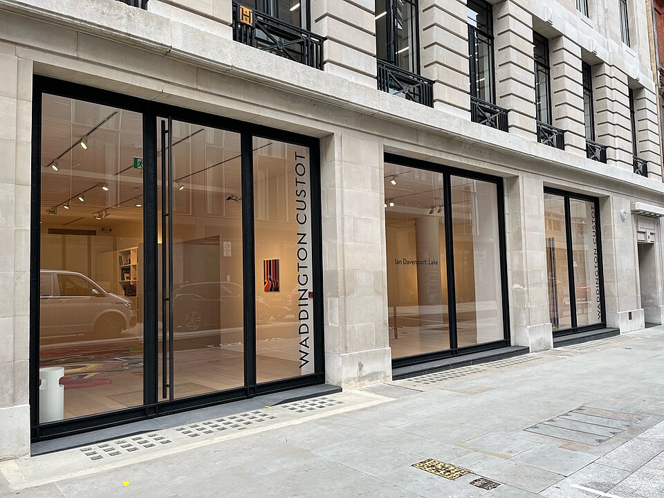 Waddington Custot logo