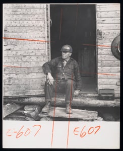 Rustic life in Canadian woods. But the lumberjack is enjoying more modern comfort. Wallace Jourdain tends a small dam for three months. "The company will give me something. . till winter."