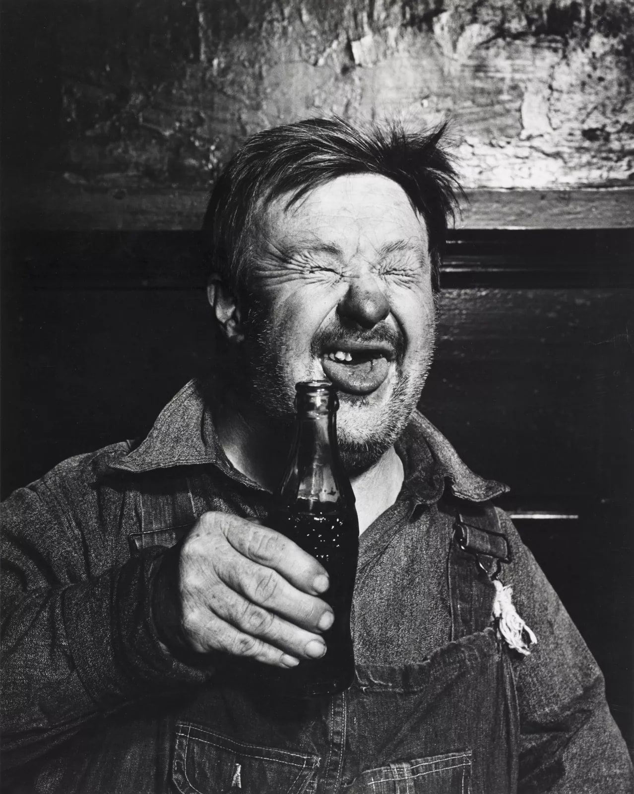 Man Drinking Coke