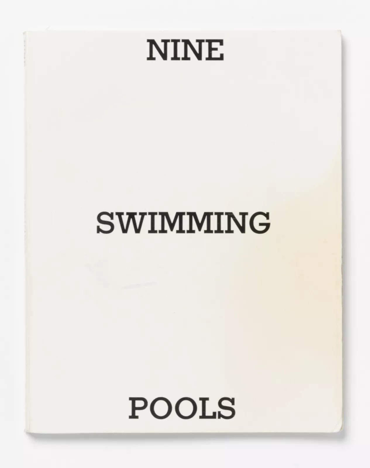 Nine Swimming Pools and a Broken Glass