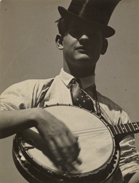 [T. Lux Feininger playing a banjo]
