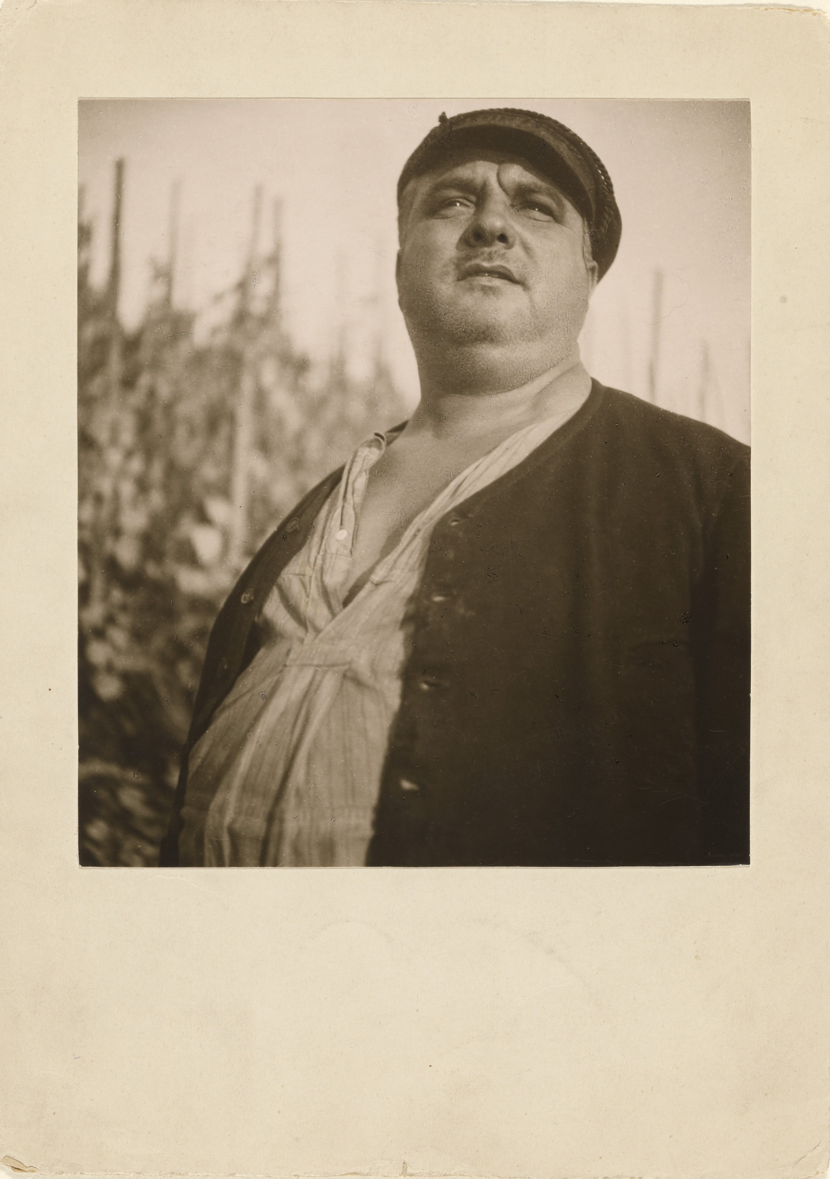 [Portrait of man in hat]