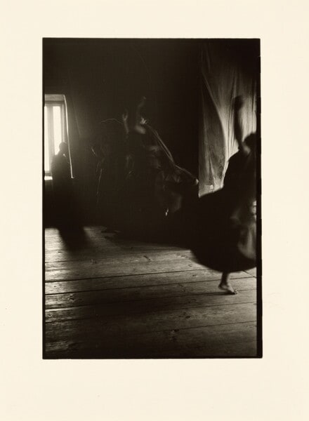 [Blurred dancers]