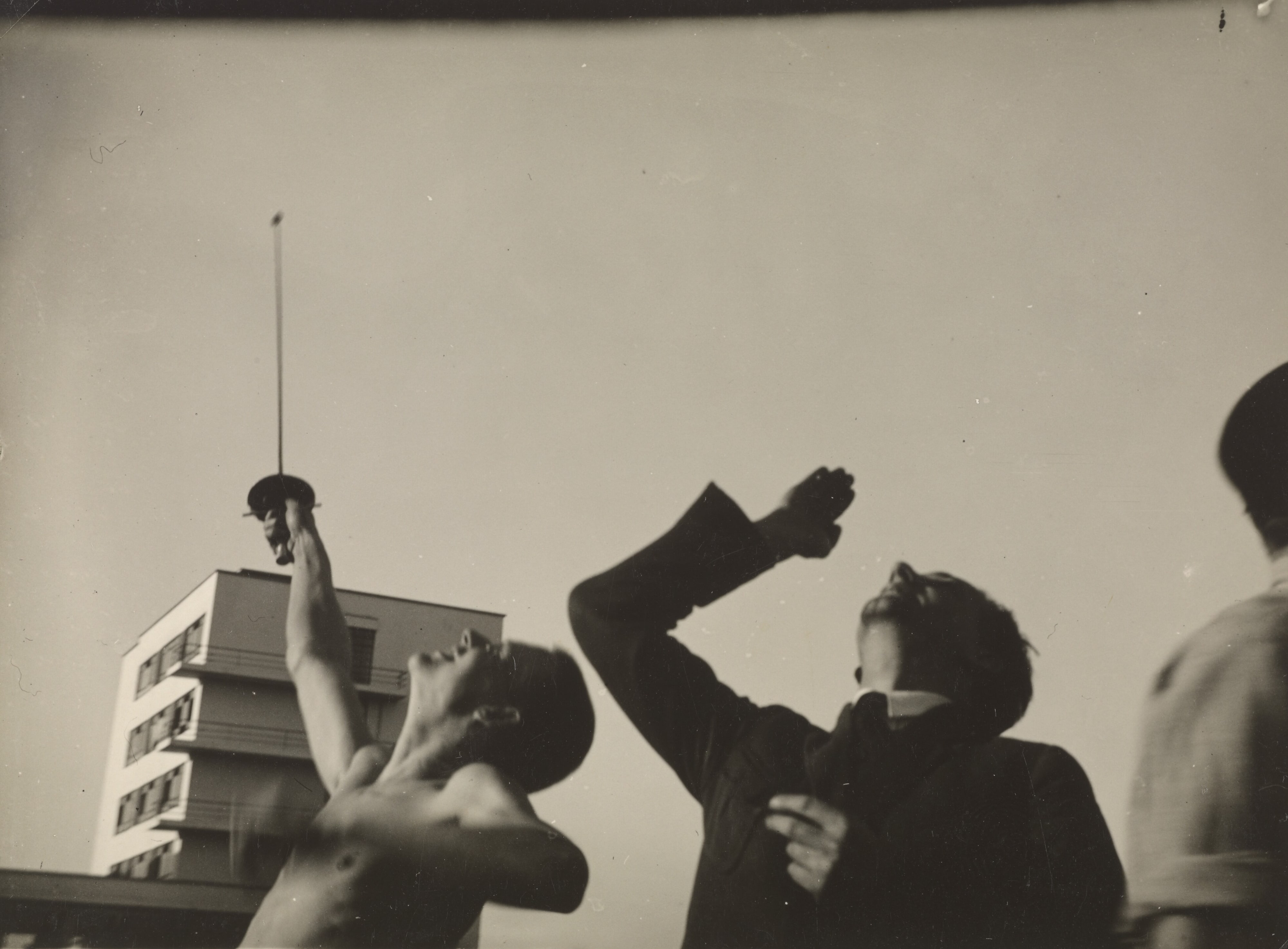 [Group on a playing field, Georg Hartmann with foil and Werner Siedhoff].