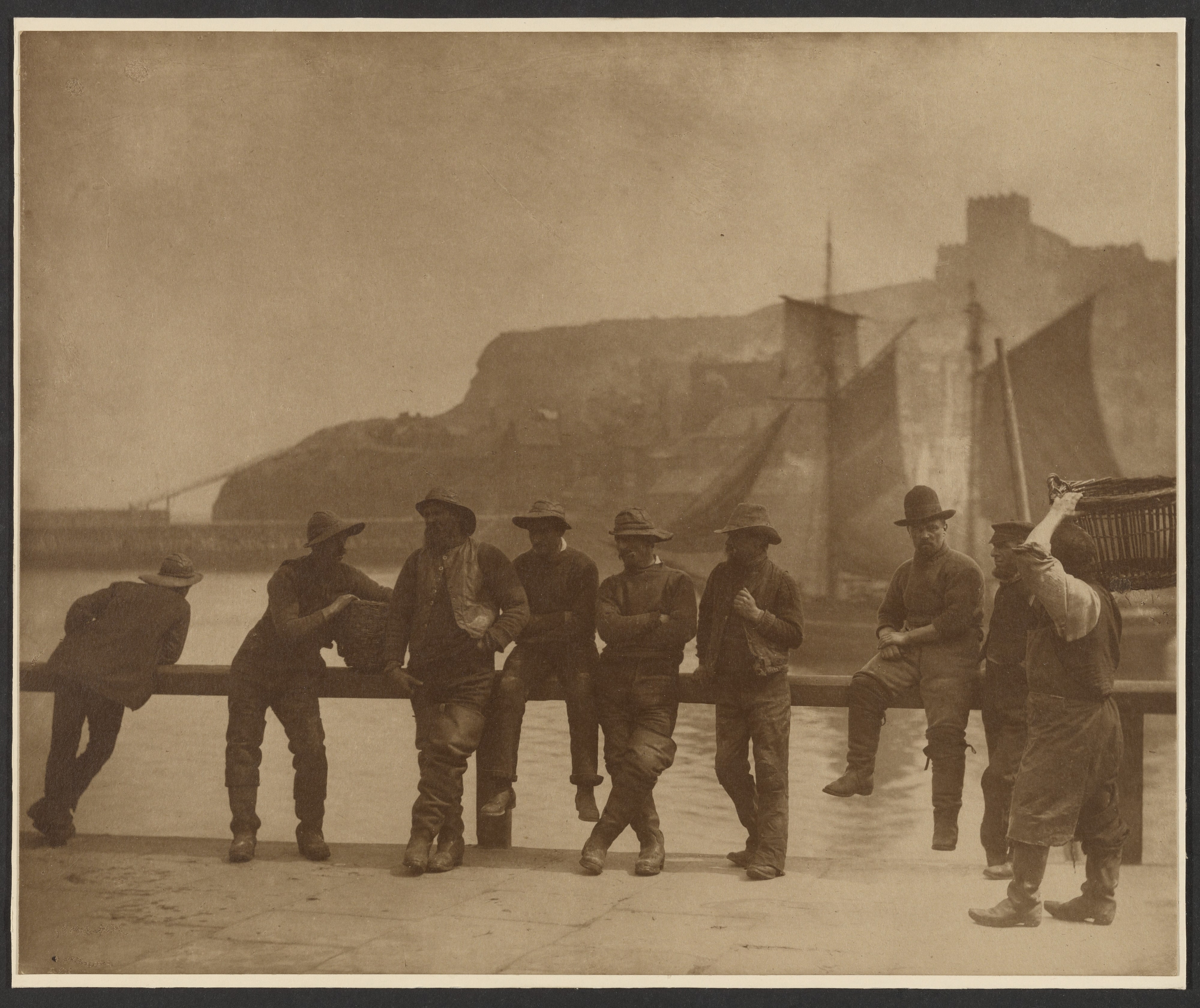 [Whitby Fishermen on the pier fence]