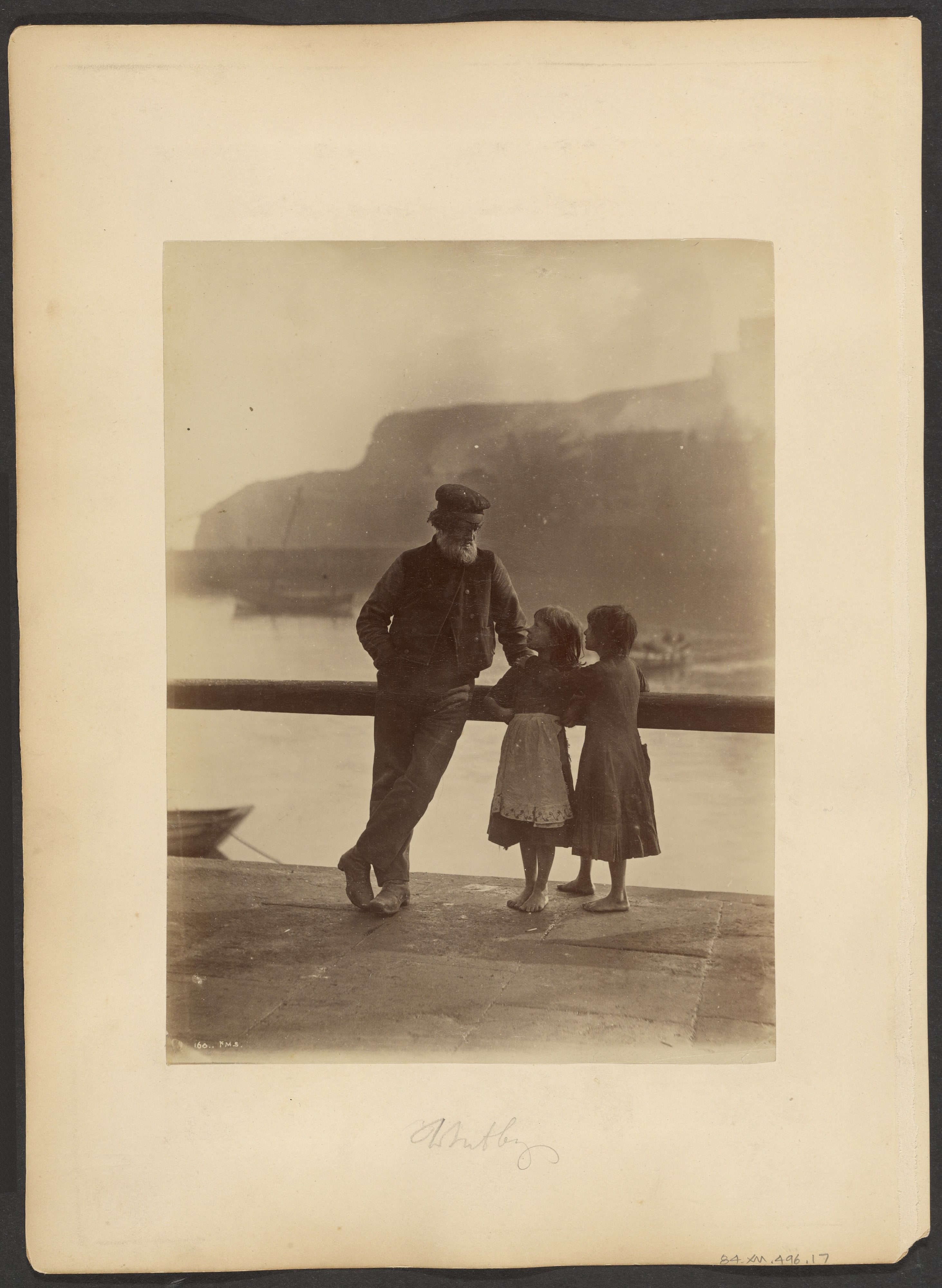 [Old man and two girls]