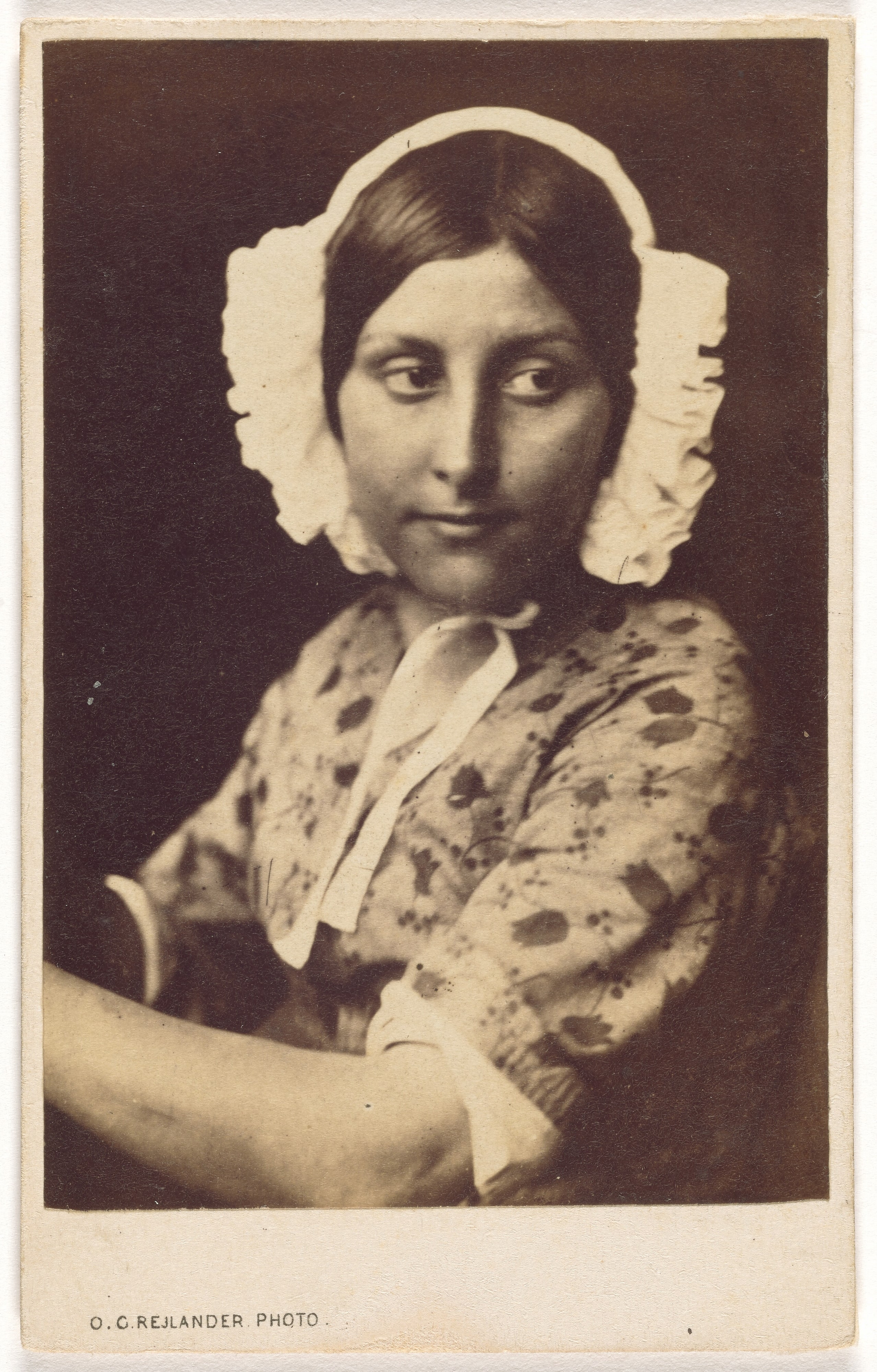 [Young Woman in a White Cap]