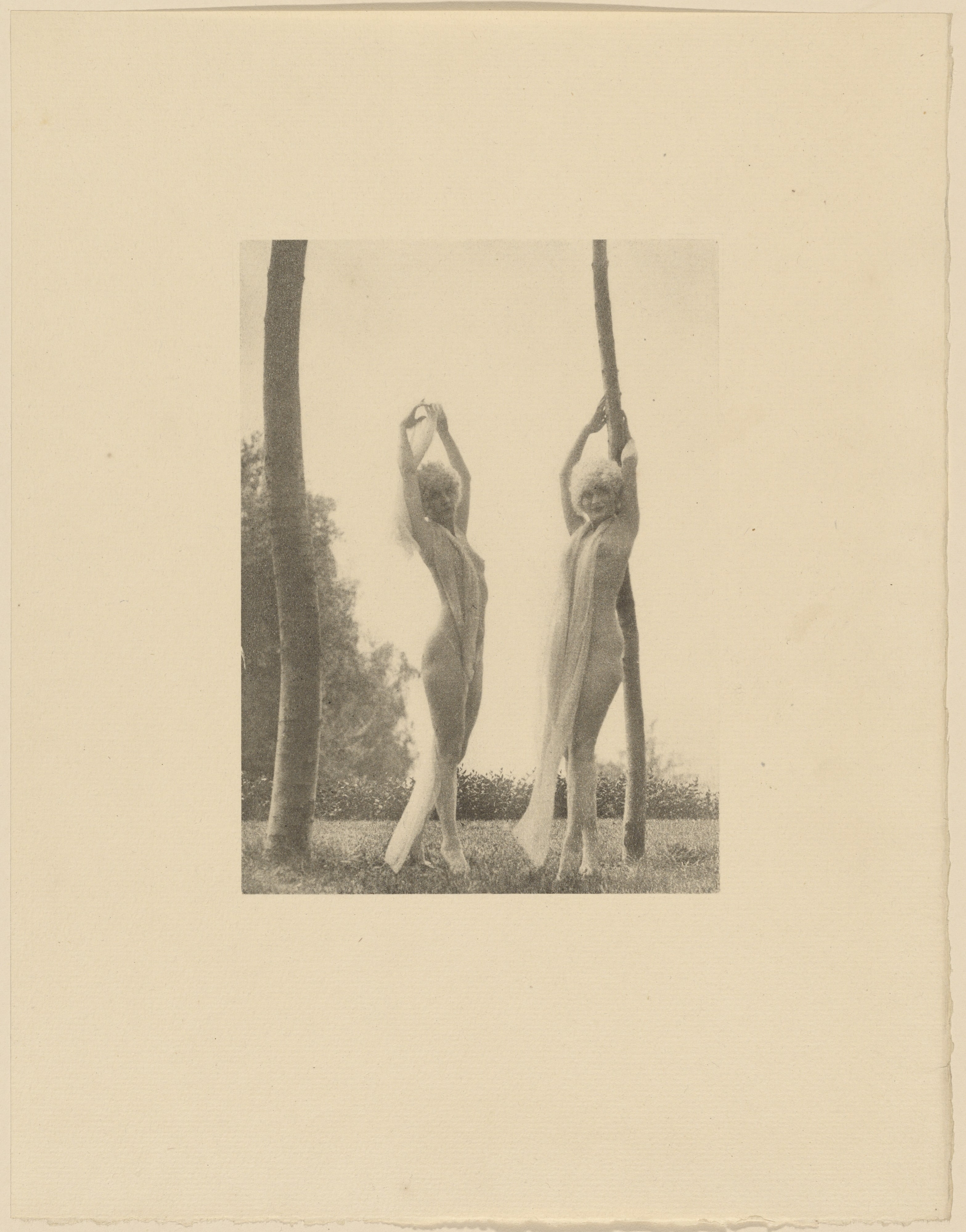 [Two Partially Nude Females in Blond Wigs Stretching Outdoors]