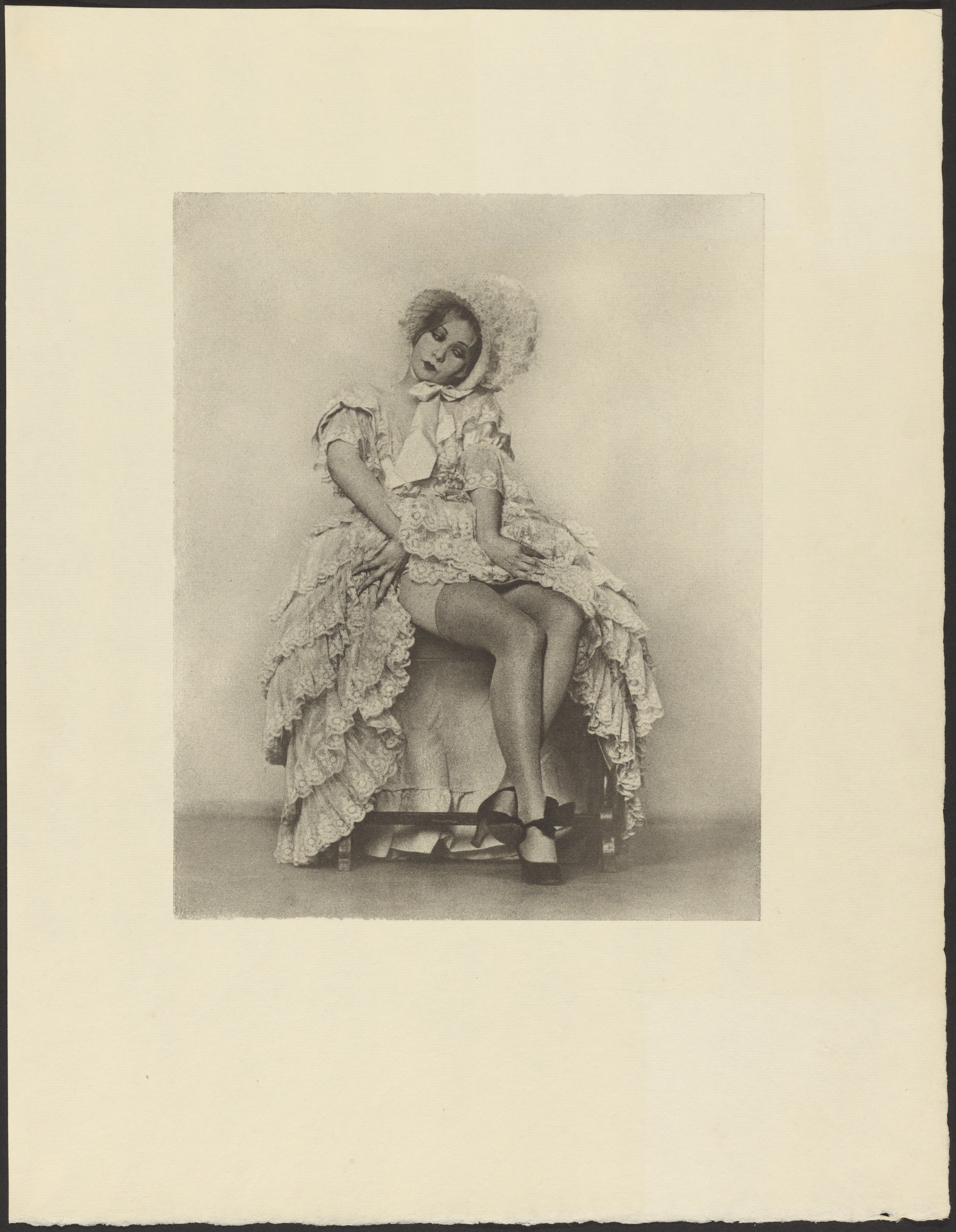 [Seated Woman in a Ruffled Dress with Coquettish Facial Expression]