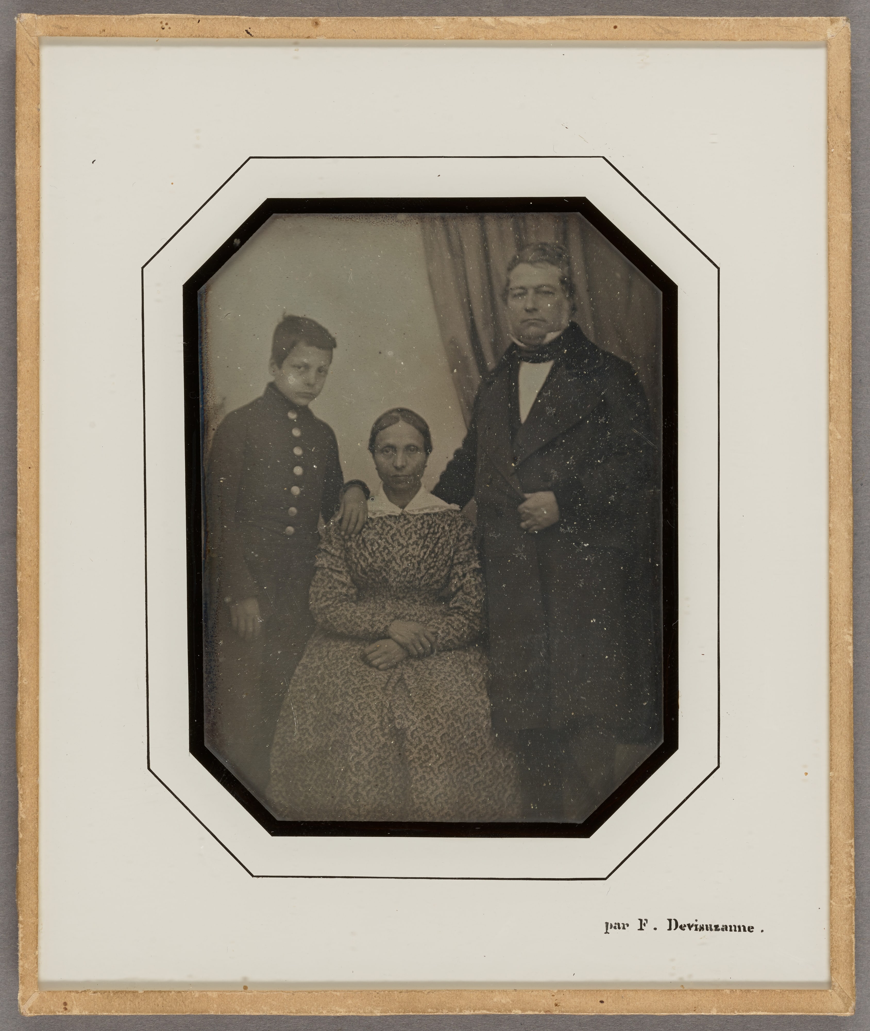 [Mr. and Mrs. Garoutte with their son Elzéar]