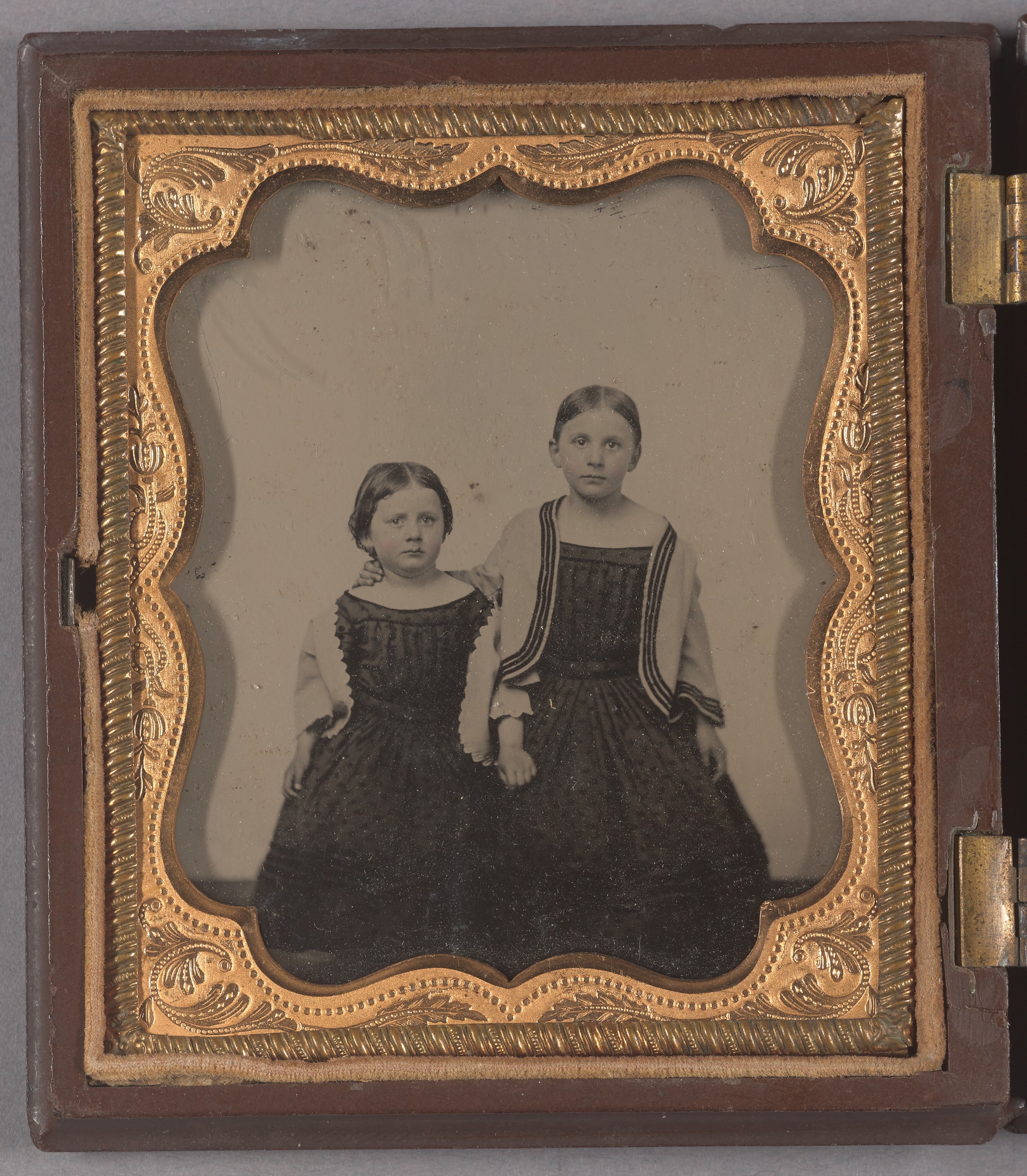 [Portrait of Two Seated Girls]