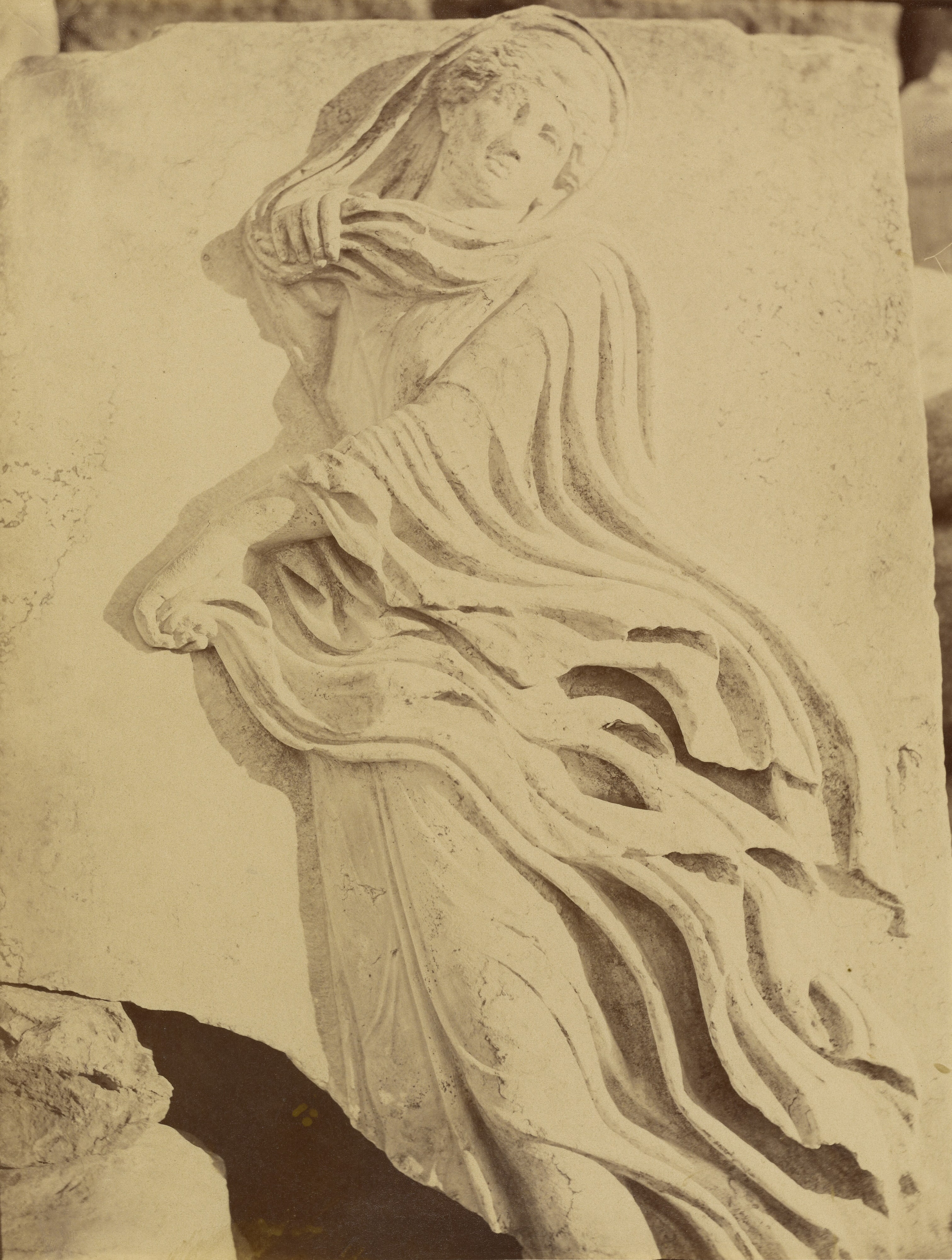 [Sculptural fragment - dancing Maenad in high relief]