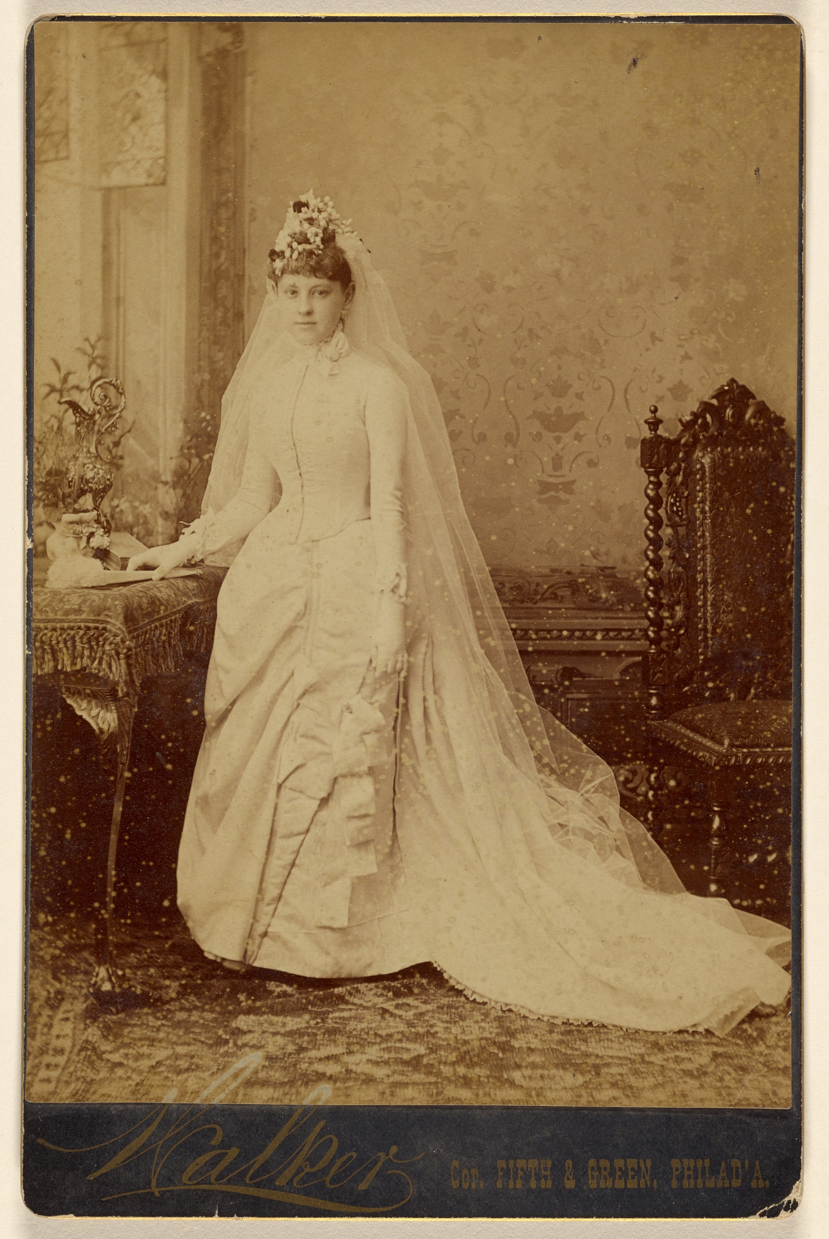 [Unidentified woman in wedding gown, standing]
