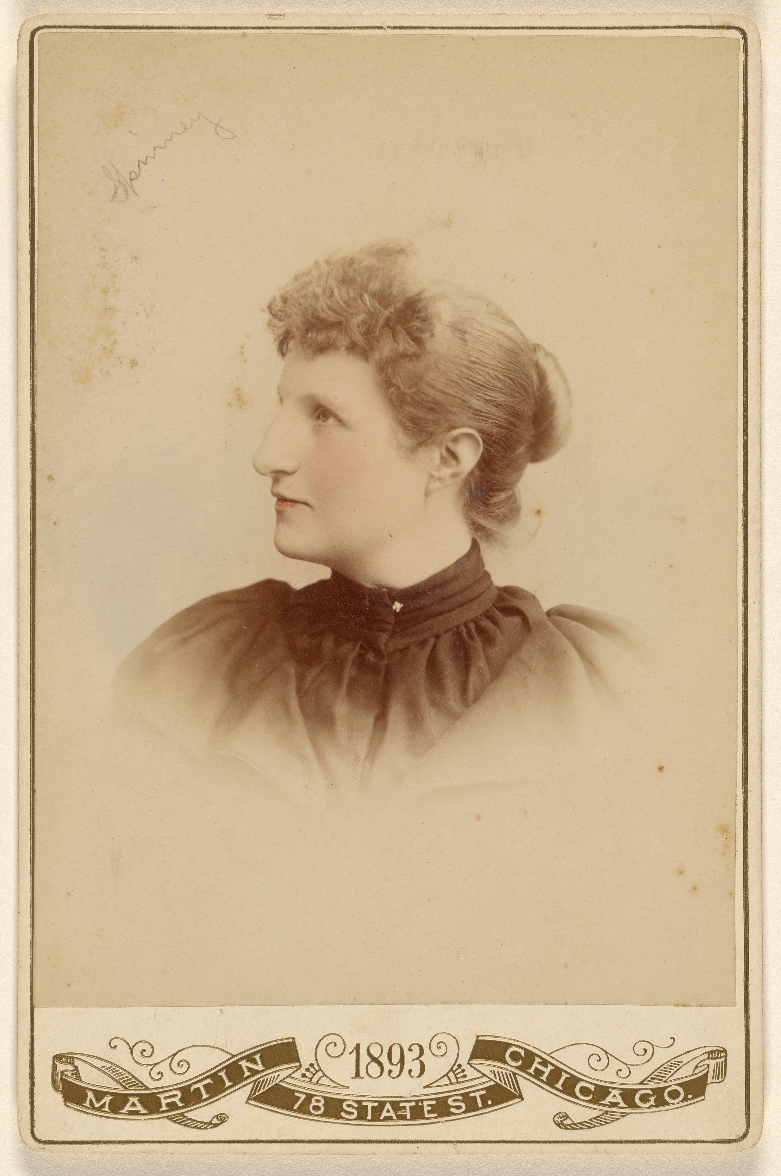 [Unidentified woman, in profile to left]