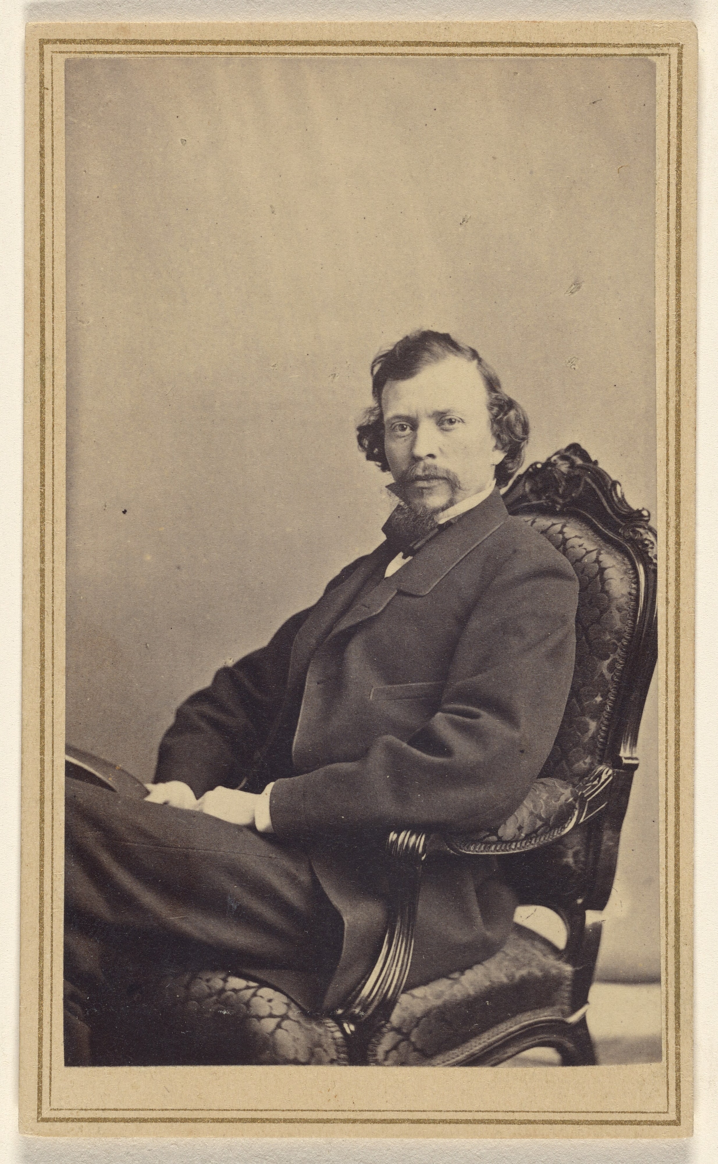 [Unidentified man with Vandyke beard, seated]