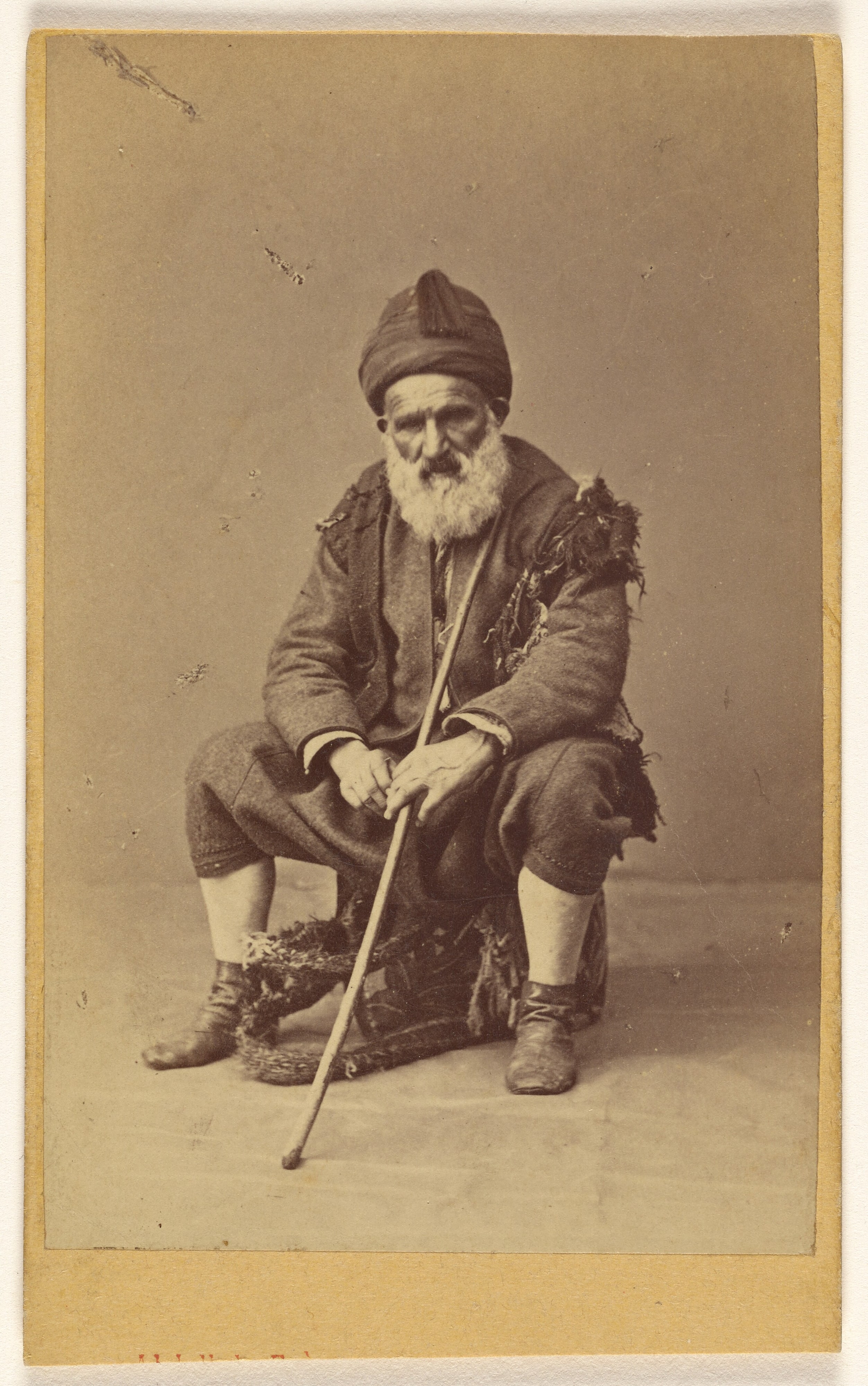 [An Older Middle Eastern Man with a Long White Beard]