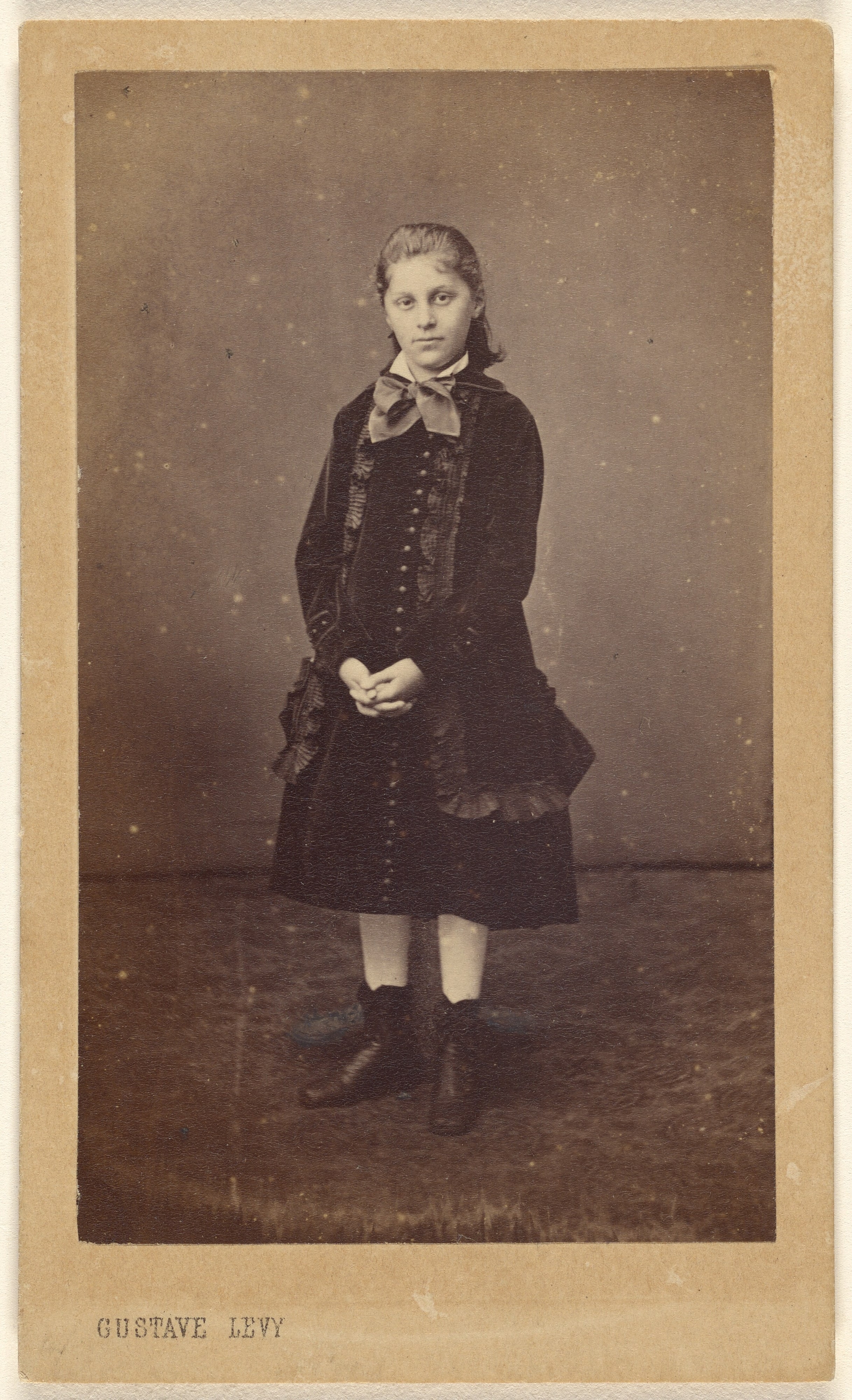 [Unidentified young woman, standing]