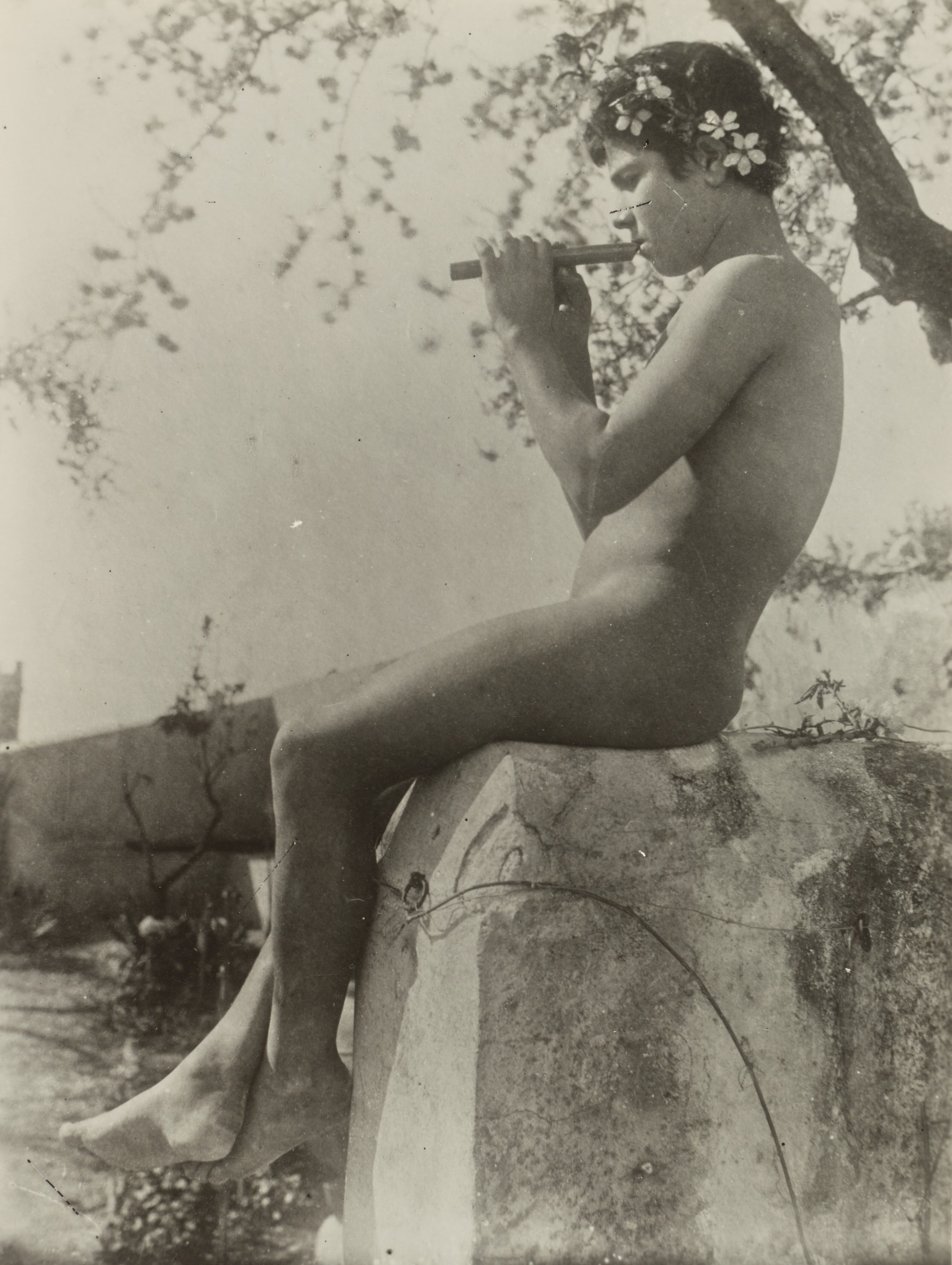 [Boy playing flute]