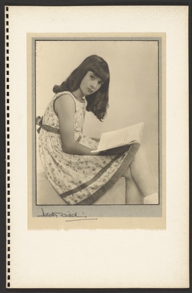 [Portrait of girl reading]