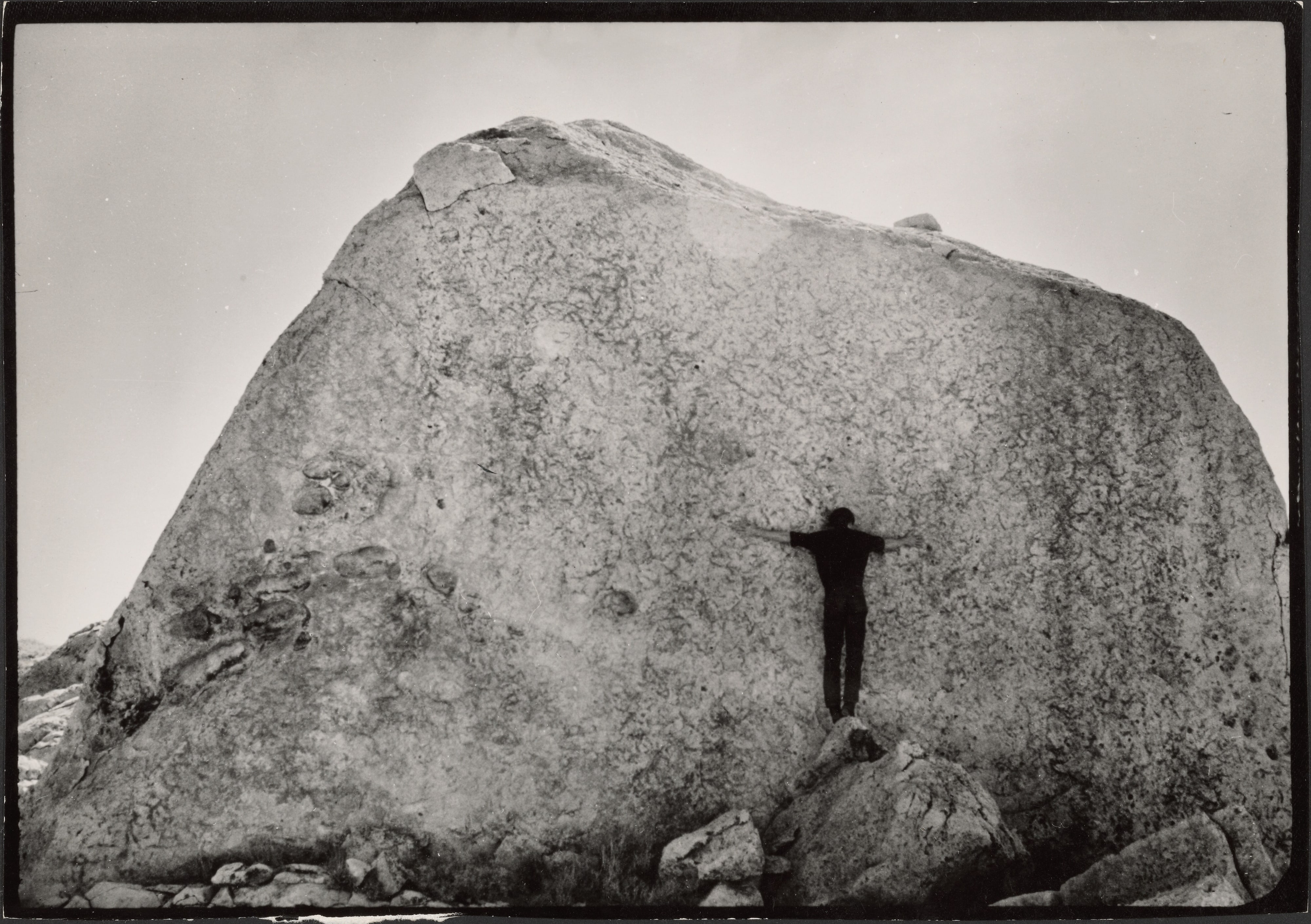 Michael Heizer measuring a rock in the desert, North Las Vegas, Nevada